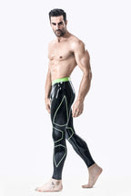 Black, trim color is Grass Green Male Tight Yoga Latex Leggings