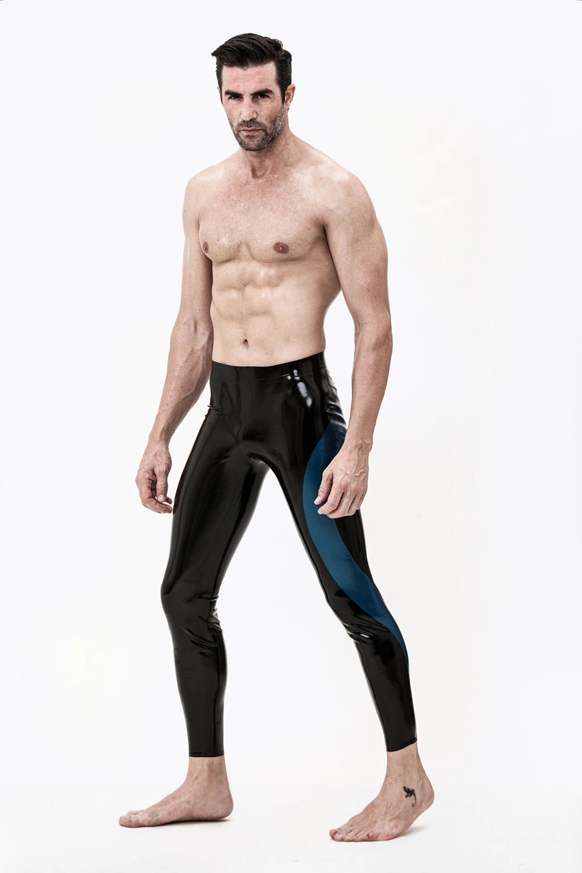 Black, trim color is Male 'Meander' Zipperless Latex Leggings