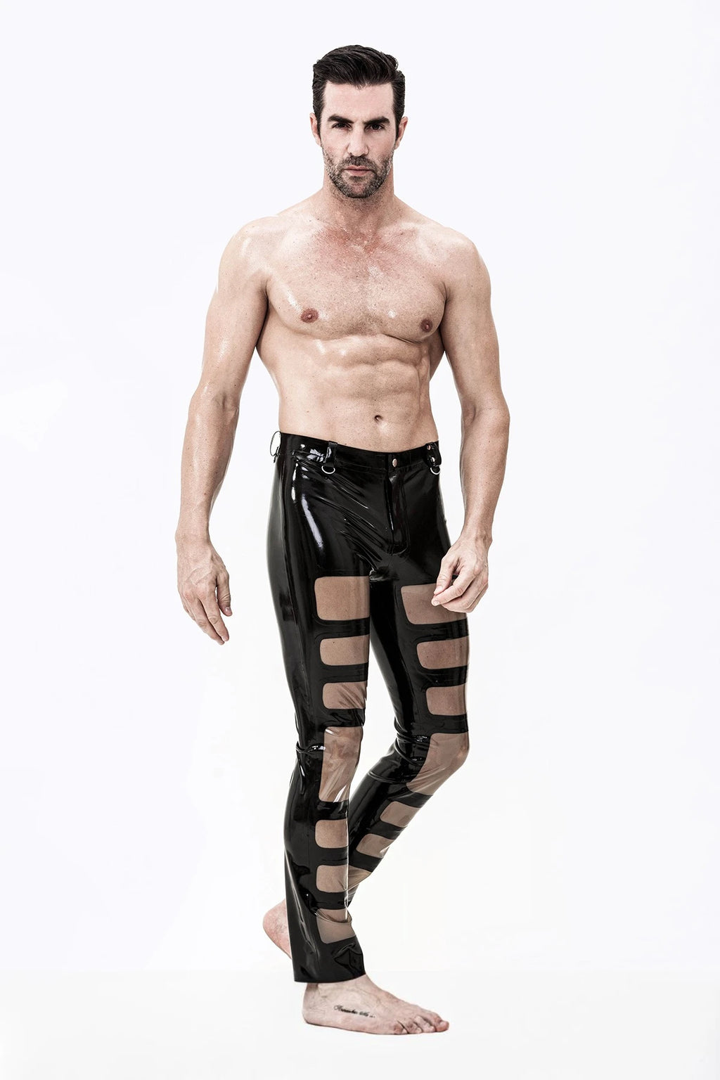 Black, trim color is Male Latex Panelled Romper Pants