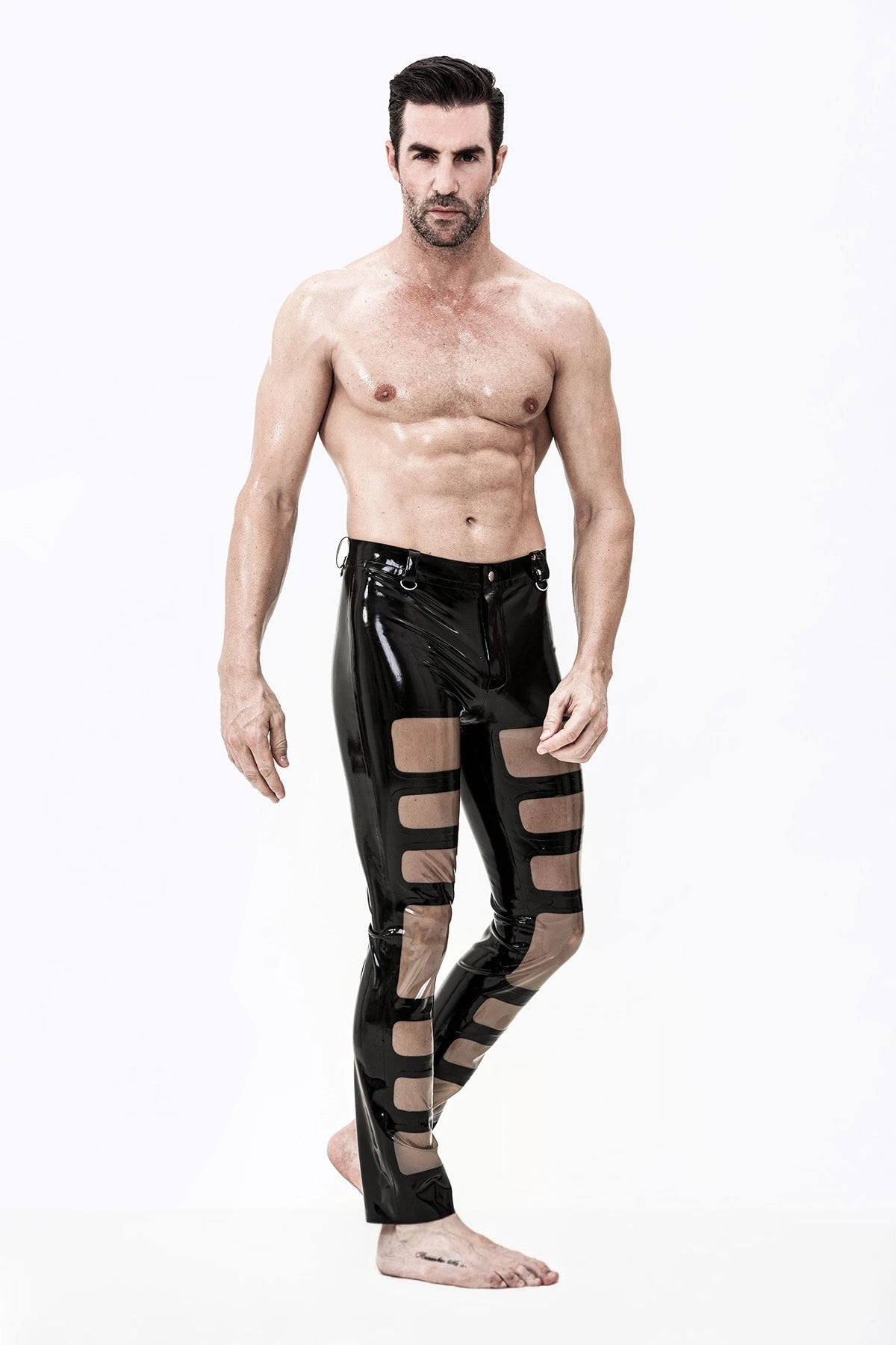Black, trim color is Male Latex Panelled Romper Pants