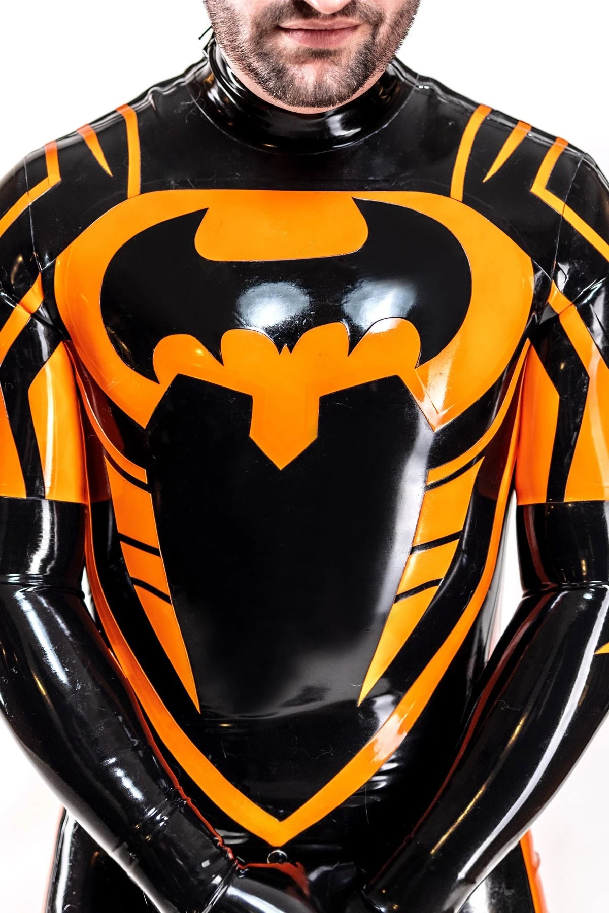 black, trim color is orange Male Anti Hero Latex Catsuit