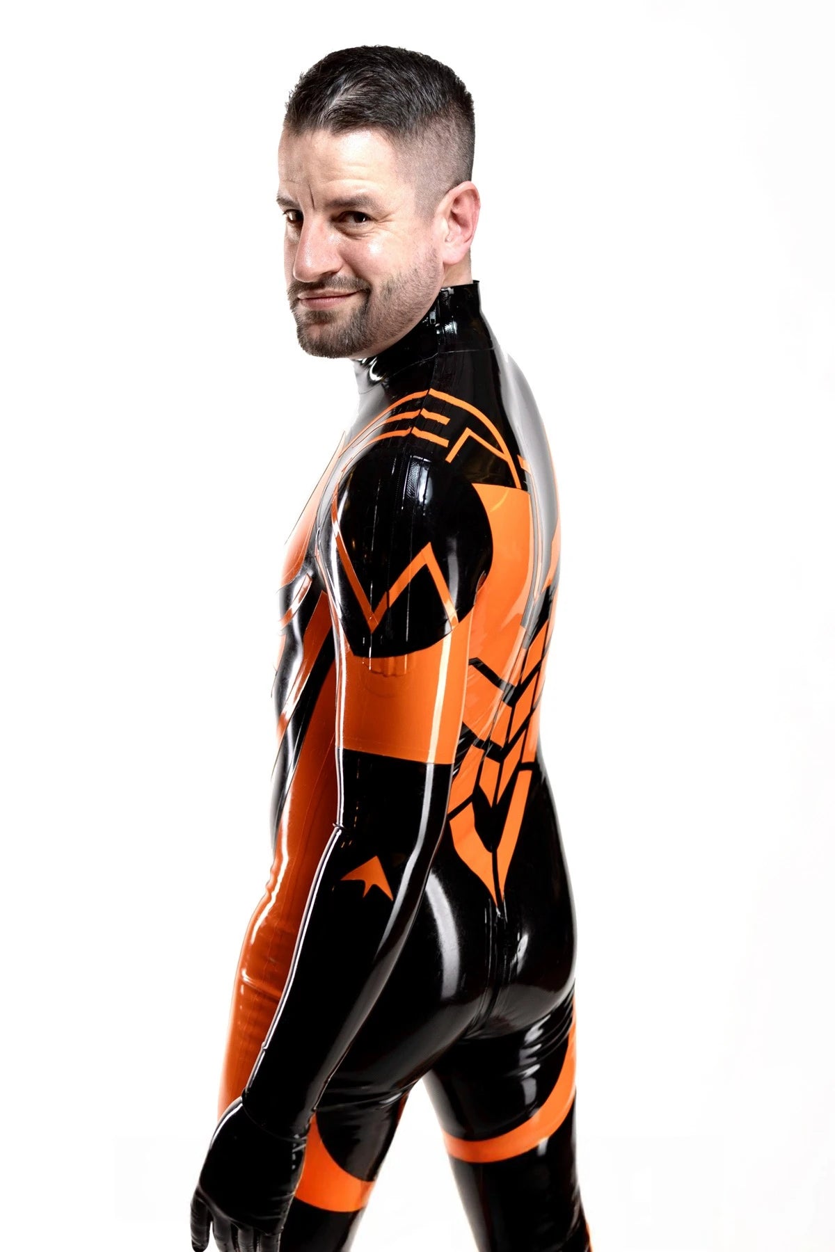 black, trim color is orange Male Anti Hero Latex Catsuit