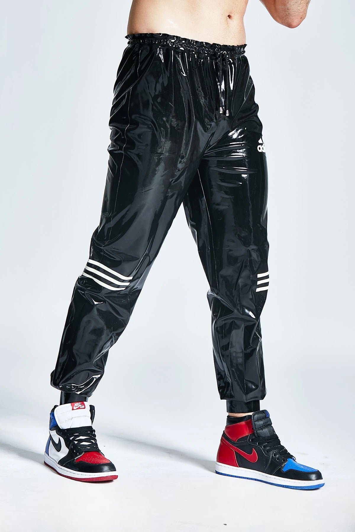 Black, trim color is Pure White Male Latex Tracksuit Pants