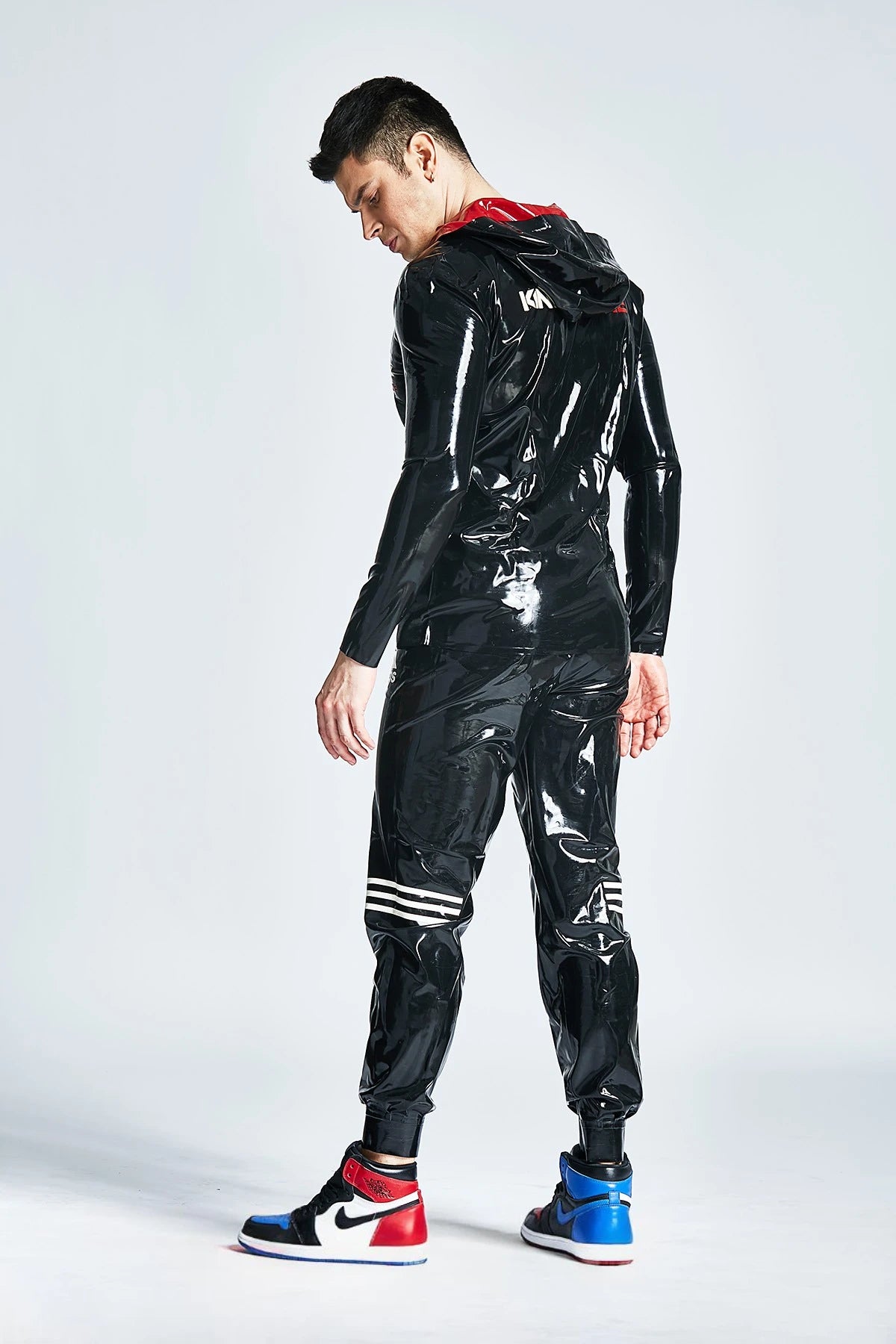 Black, trim color is Pure White Male Latex Tracksuit Pants