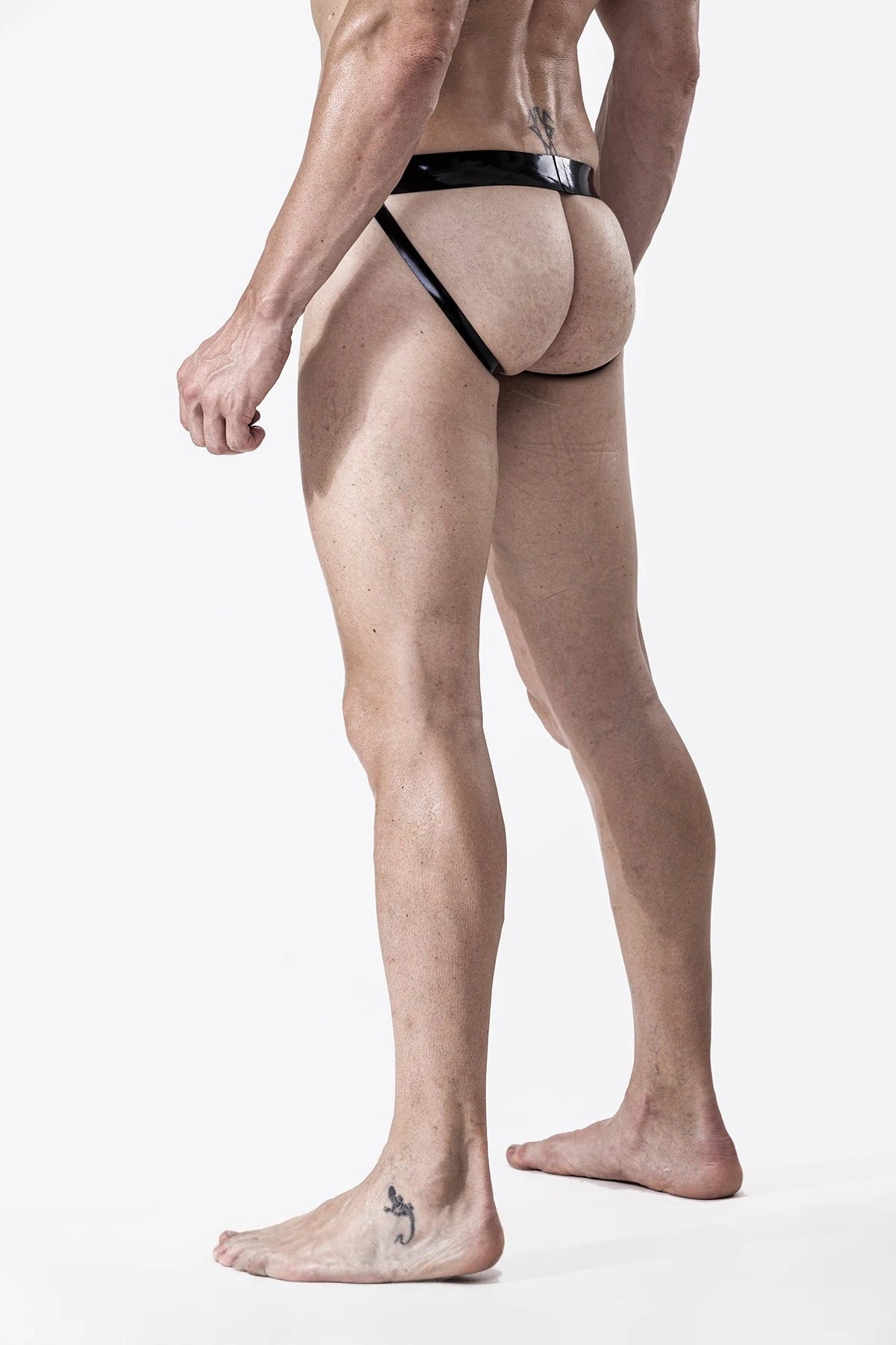 Black, trim color is Red Male Latex Codpiece Jockstrap