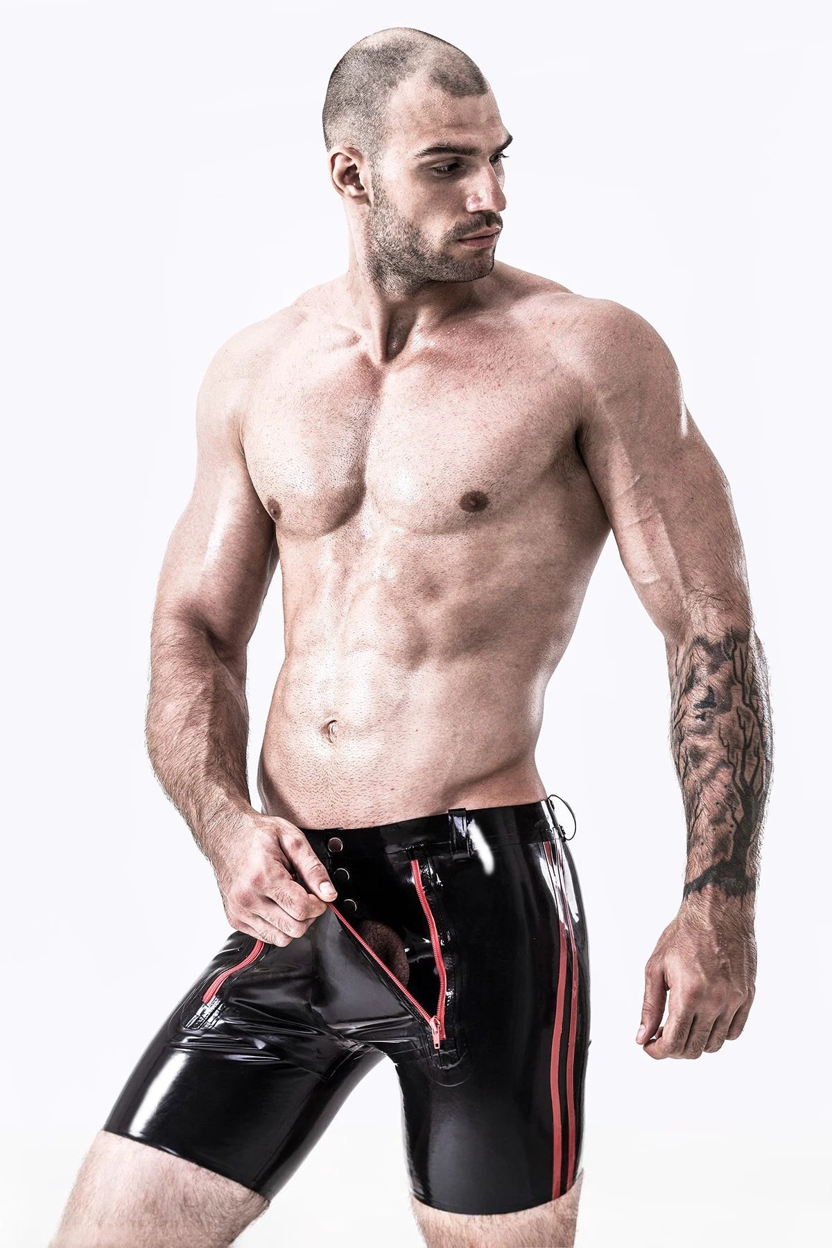 Black, trim color is Red Male Latex Front Double Zip Shorts
