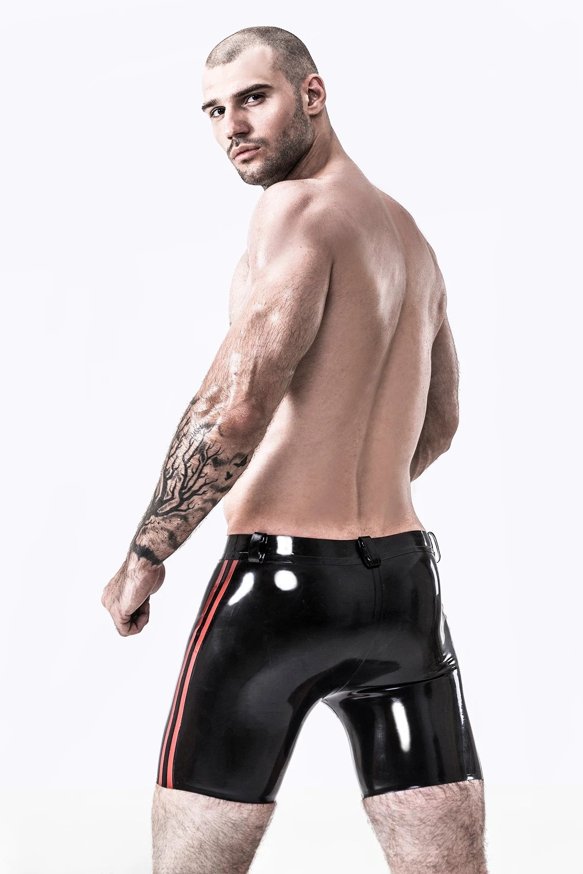 Black, trim color is Red Male Latex Front Double Zip Shorts