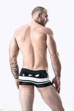 Black, trim color is White Male Latex 'Stripes Ahoy' Brief