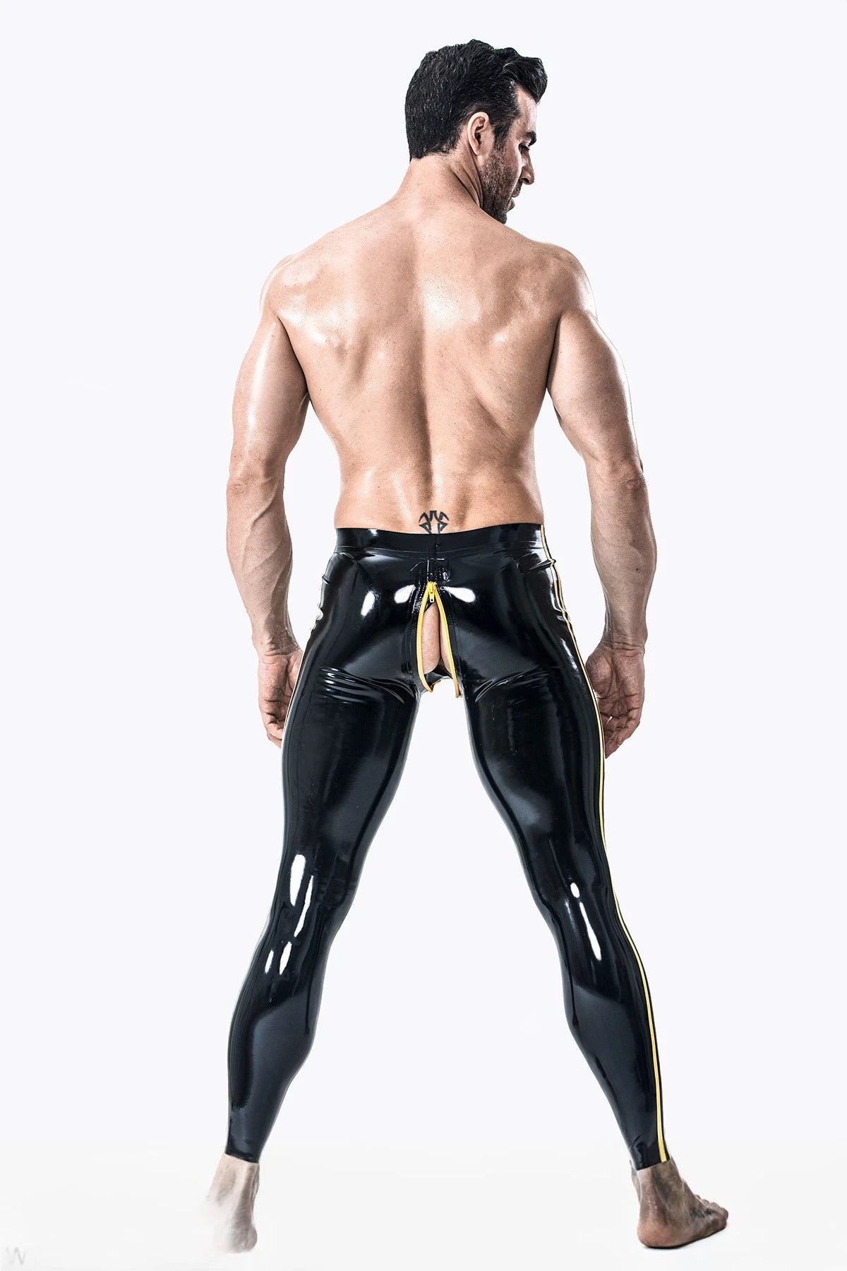 Black, trim color is Yellow Male Two-Stripes Latex Leggings