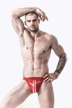 Red, secondary color is White Male Latex Double Line Jockstrap