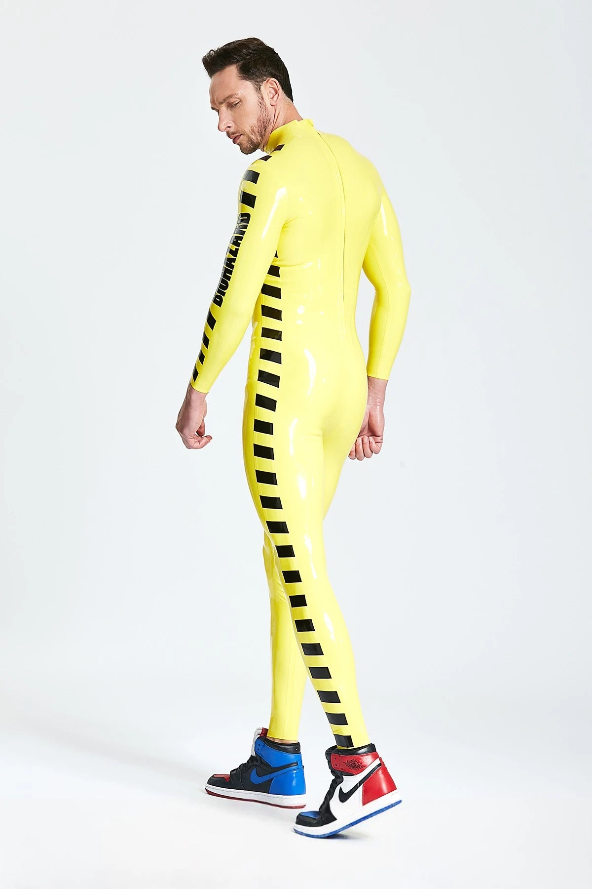 Yellow, trim color is Black Male 'Biohazard' Latex Catsuit
